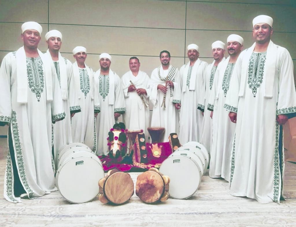 Egyptian zaffa performers in traditional dress with drums